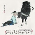 Niño Fangzeng y vaca viejo chino.